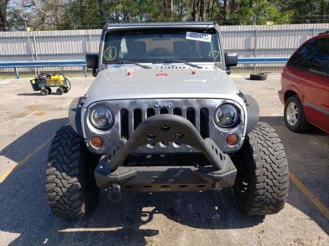 Photo 5 from auction – 2011 JEEP WRANGLER U with VIN 1J4BA5H15BL522361