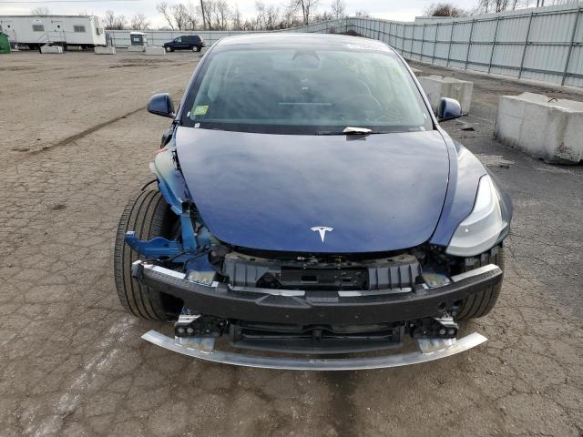 Photo 5 from auction – 2022 TESLA MODEL 3 with VIN 5YJ3E1EB2NF184994
