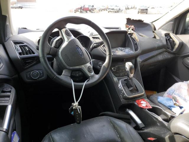 Photo 8 from auction – 2014 FORD ESCAPE TIT with VIN 1FMCU0JX1EUB62129