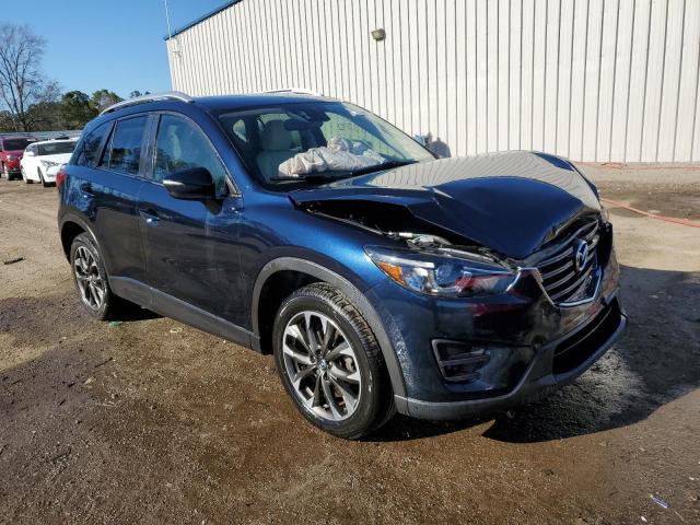 Photo 4 from auction – 2016 MAZDA CX-5 GT with VIN JM3KE4DY3G0621039
