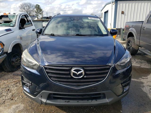 Photo 5 from auction – 2016 MAZDA CX-5 GT with VIN JM3KE2DY6G0656159