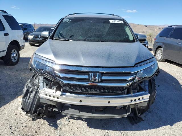 Photo 5 from auction – 2017 HONDA PILOT TOUR with VIN 5FNYF6H90HB015733