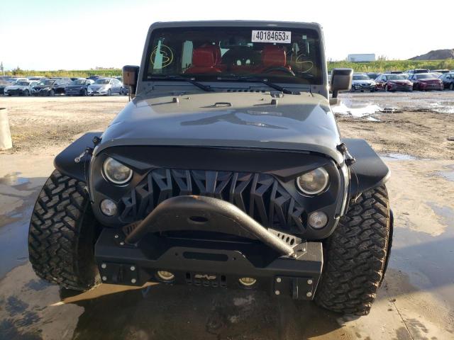 Photo 5 from auction – 2015 JEEP WRANGLER U with VIN 1C4BJWFG9FL531492