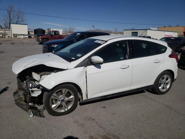 FORD FOCUS SE 2014 with VIN 1FADP3K29EL112059 - Photo from auction