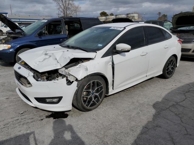 FORD FOCUS SE 2016 with VIN 1FADP3F22GL369013 - Photo from auction