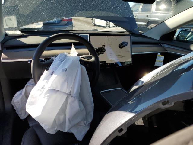 Photo 8 from auction – 2022 TESLA MODEL 3 with VIN 5YJ3E1EA9NF142720