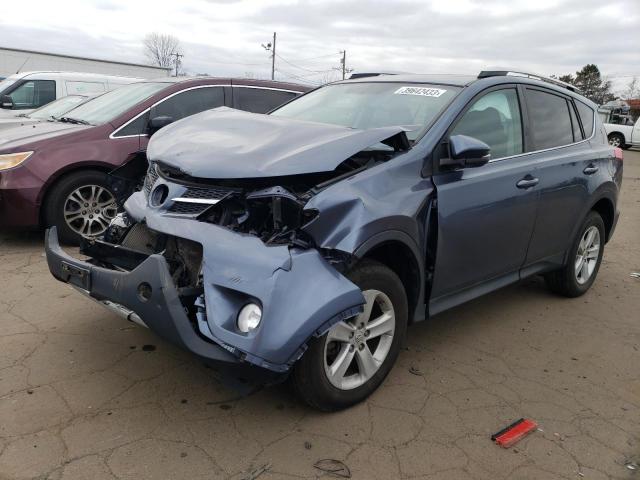 TOYOTA RAV4 XLE 2014 with VIN 2T3RFREV7EW199758 - Photo from auction