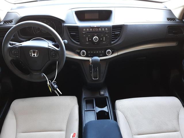 Photo 8 from auction – 2016 HONDA CR-V LX with VIN 5J6RM3H36GL007128
