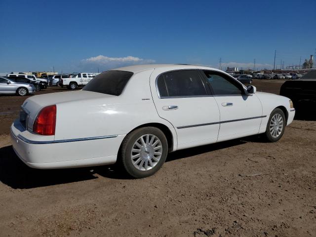 Photo 3 from auction – 2003 LINCOLN TOWN CAR with VIN 1LNHM82W23Y653468