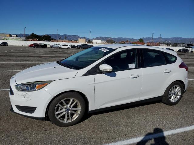 FORD FOCUS SE 2015 with VIN 1FADP3K20FL351145 - Photo from auction
