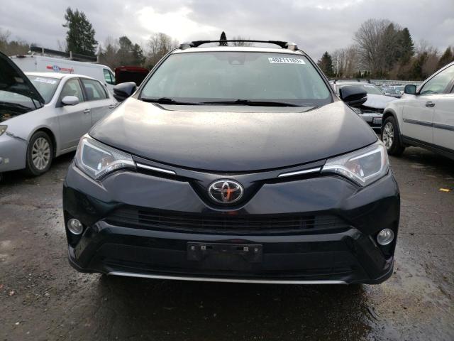 Photo 5 from auction – 2016 TOYOTA RAV4 XLE with VIN 2T3RFREV3GW468163