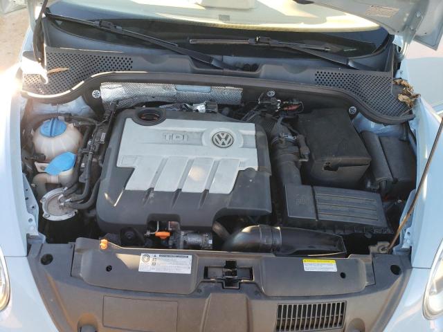 Photo 11 from auction – 2013 VOLKSWAGEN BEETLE with VIN 3VW5L7AT7DM824673