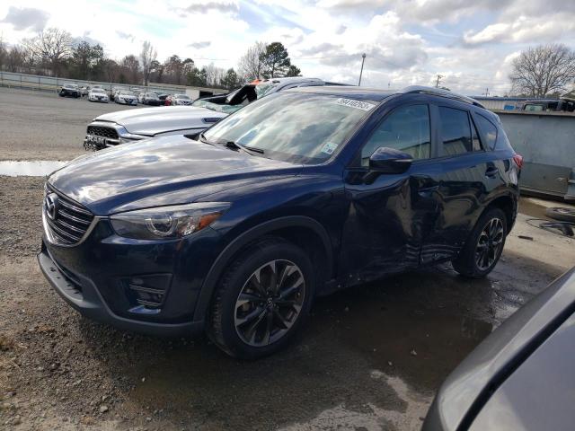 MAZDA CX-5 GT 2016 with VIN JM3KE2DY6G0656159 - Photo from auction
