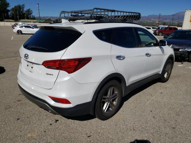 Photo 3 from auction – 2017 HYUNDAI SANTA FE S with VIN 5NMZU3LB8HH021720