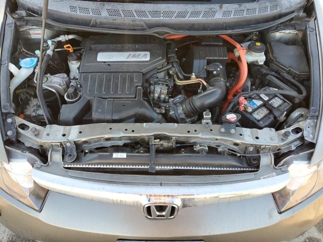Photo 11 from auction – 2006 HONDA CIVIC HYBR with VIN JHMFA36296S014251