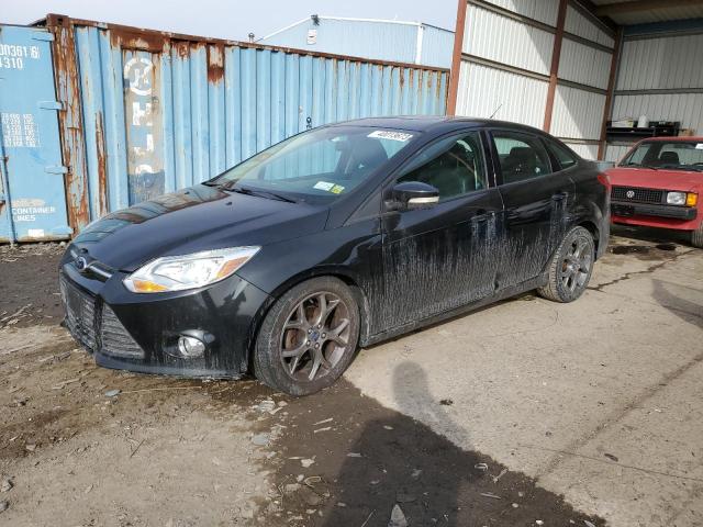 FORD FOCUS SE 2014 with VIN 1FADP3F20EL333723 - Photo from auction