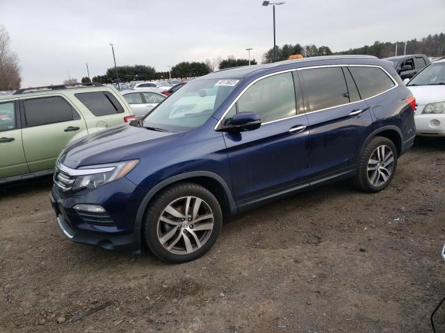 HONDA PILOT TOUR 2018 with VIN 5FNYF6H94JB020200 - Photo from auction
