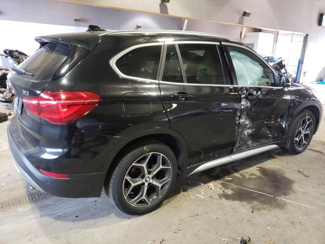 Photo 3 from auction – 2017 BMW X1 XDRIVE2 with VIN WBXHT3C39H5F74893