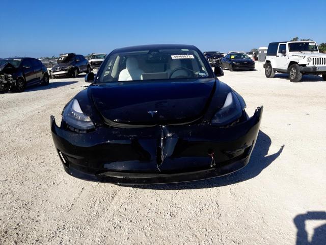 Photo 5 from auction – 2021 TESLA MODEL 3 with VIN 5YJ3E1EB3MF026419