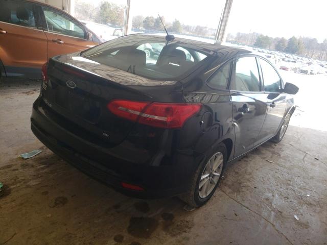 Photo 3 from auction – 2017 FORD FOCUS SE with VIN 1FADP3F27HL315093