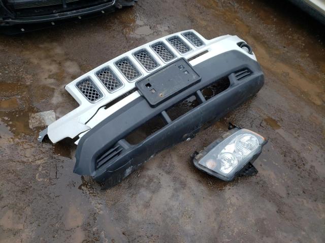 Photo 12 from auction – 2014 JEEP COMPASS LA with VIN 1C4NJDEB2ED520916