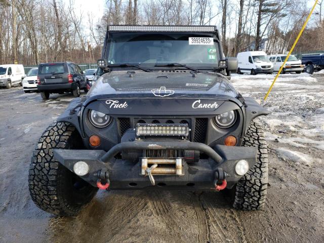 Photo 5 from auction – 2012 JEEP WRANGLER U with VIN 1C4HJWEGXCL170054