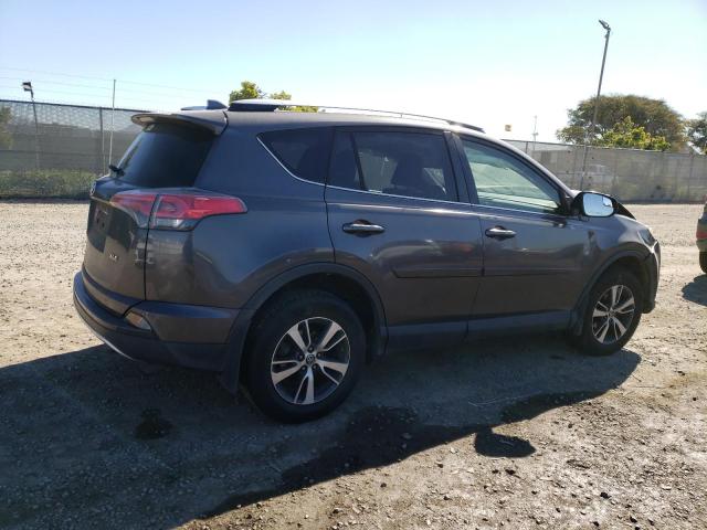 Photo 3 from auction – 2016 TOYOTA RAV4 XLE with VIN JTMWFREV0GJ072323