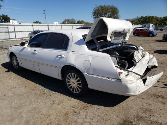 Photo 2 from auction – 2003 LINCOLN TOWN CAR E with VIN 1LNHM81W03Y623712