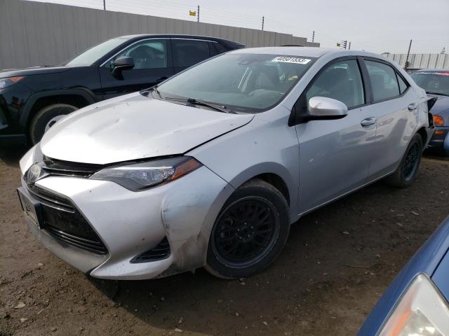 TOYOTA COROLLA L 2017 with VIN 5YFBURHE9HP619148 - Photo from auction