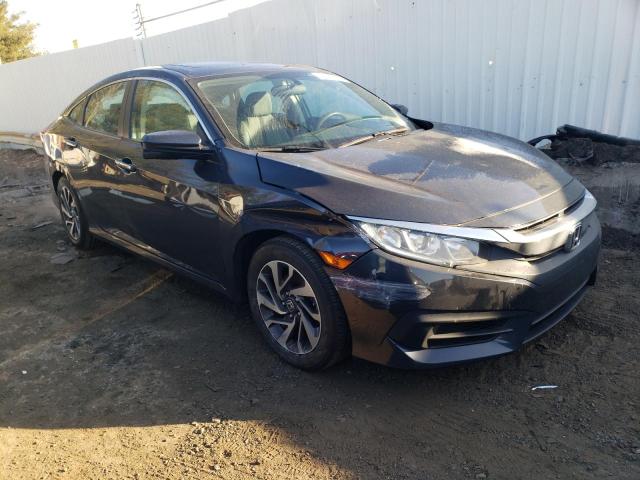 Photo 4 from auction – 2018 HONDA CIVIC EX with VIN 19XFC2F77JE004735