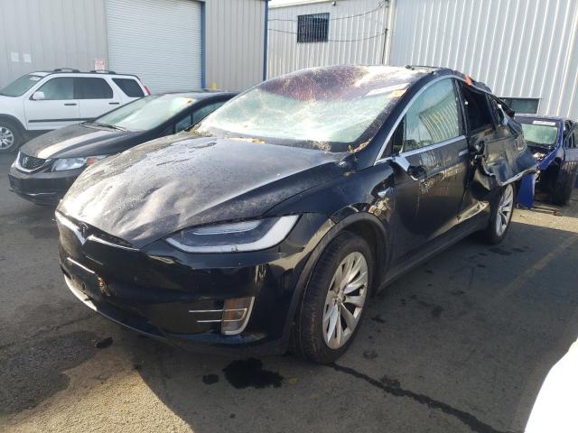 TESLA MODEL X 2018 with VIN 5YJXCDE27JF142677 - Photo from auction