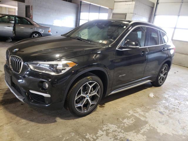 BMW X1 XDRIVE2 2017 with VIN WBXHT3C39H5F74893 - Photo from auction