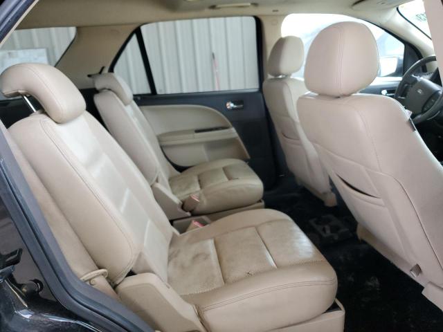 Photo 11 from auction – 2008 FORD TAURUS X E with VIN 1FMDK07W98GA23359