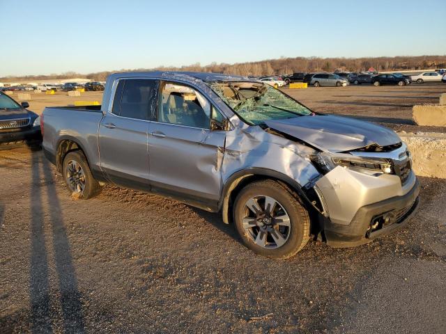 Photo 4 from auction – 2017 HONDA RIDGELINE with VIN 5FPYK3F51HB008419