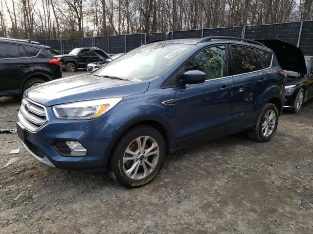 FORD ESCAPE SE 2018 with VIN 1FMCU9GD8JUC72820 - Photo from auction