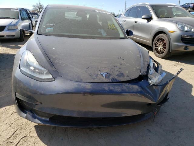 Photo 5 from auction – 2018 TESLA MODEL 3 with VIN 5YJ3E1EA5JF028286