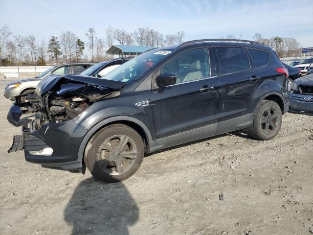 FORD ESCAPE SE 2014 with VIN 1FMCU0GX1EUD77131 - Photo from auction
