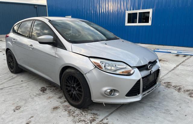 FORD FOCUS SE 2012 with VIN 1FAHP3K27CL323923 - Photo from auction