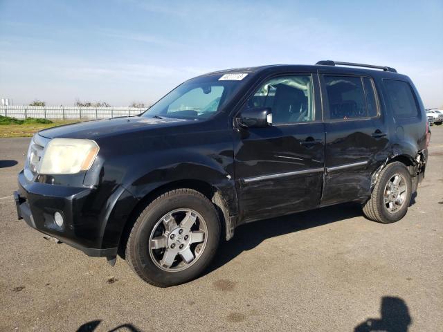 HONDA PILOT TOUR 2010 with VIN 5FNYF3H9XAB008633 - Photo from auction