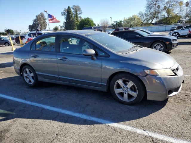 Photo 4 from auction – 2010 HONDA CIVIC LX-S with VIN 19XFA1F69AE080321