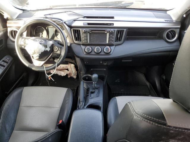 Photo 8 from auction – 2018 TOYOTA RAV4 LE with VIN JTMZFREV8JJ722536