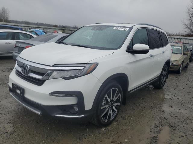 HONDA PILOT TOUR 2022 with VIN 5FNYF6H67NB091693 - Photo from auction