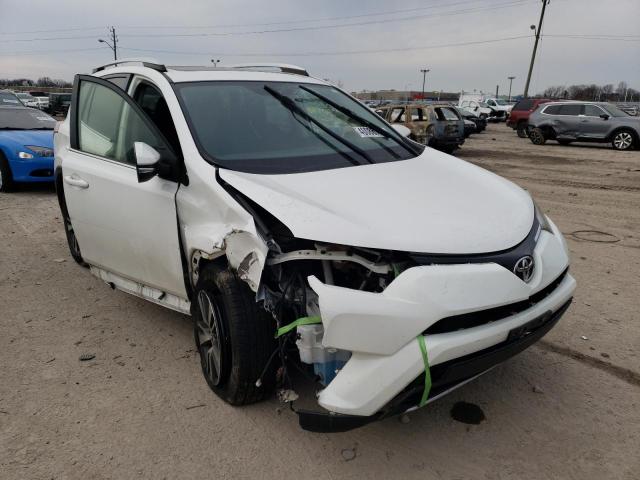 Photo 4 from auction – 2016 TOYOTA RAV4 XLE with VIN JTMWFREV2GJ062117