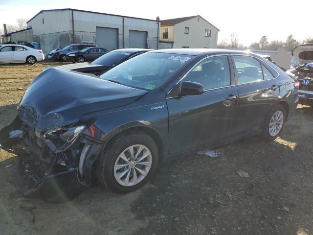 TOYOTA CAMRY HYBR 2016 with VIN 4T1BD1FK5GU189545 - Photo from auction