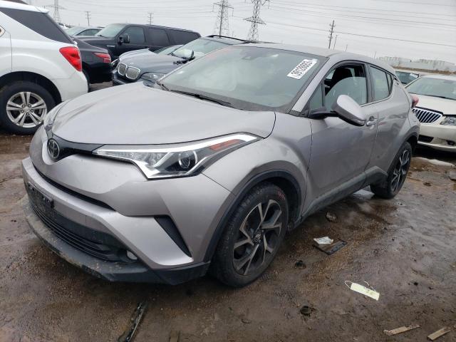 TOYOTA C-HR XLE 2019 with VIN NMTKHMBX8KR079290 - Photo from auction