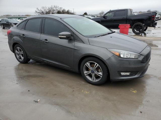 Photo 4 from auction – 2017 FORD FOCUS SE with VIN 1FADP3FE6HL289998