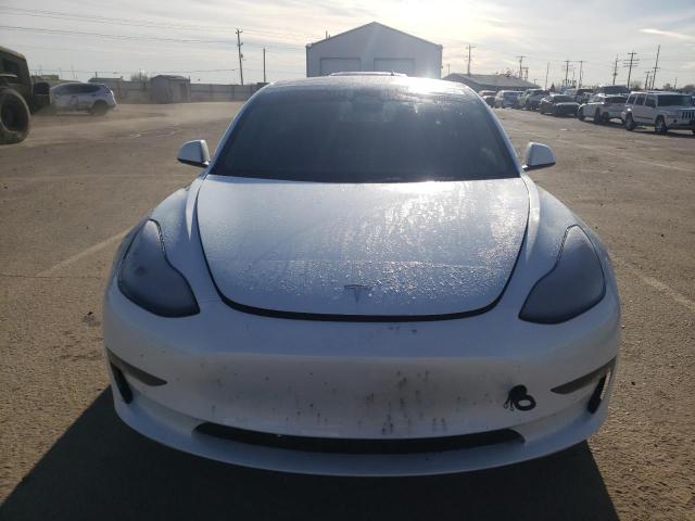 Photo 5 from auction – 2022 TESLA MODEL 3 with VIN 5YJ3E1EB5NF329848