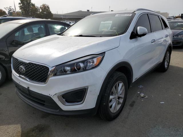 KIA SORENTO LX 2016 with VIN 5XYPGDA37GG091637 - Photo from auction