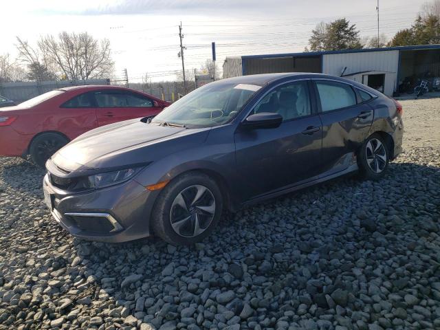 HONDA CIVIC LX 2019 with VIN 19XFC2F61KE036671 - Photo from auction