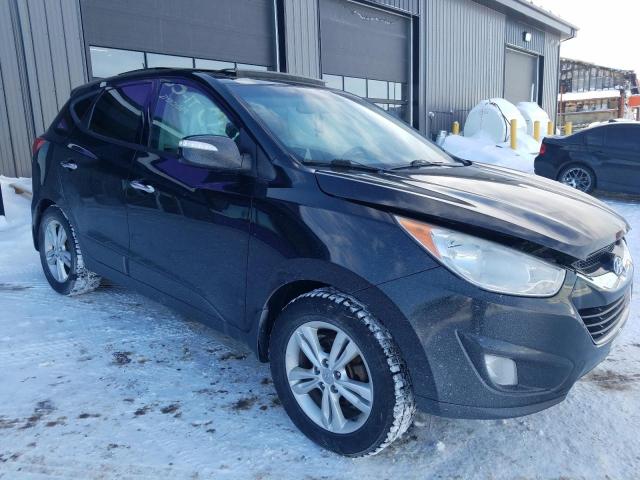 Photo 4 from auction – 2012 HYUNDAI TUCSON GLS with VIN KM8JUCAC6CU350762